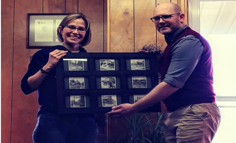 Dr Wyman donating photos to the Erie Zoo